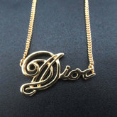 Vintage Christian Dior logo chain necklace pendant in GP gold for women — Like New