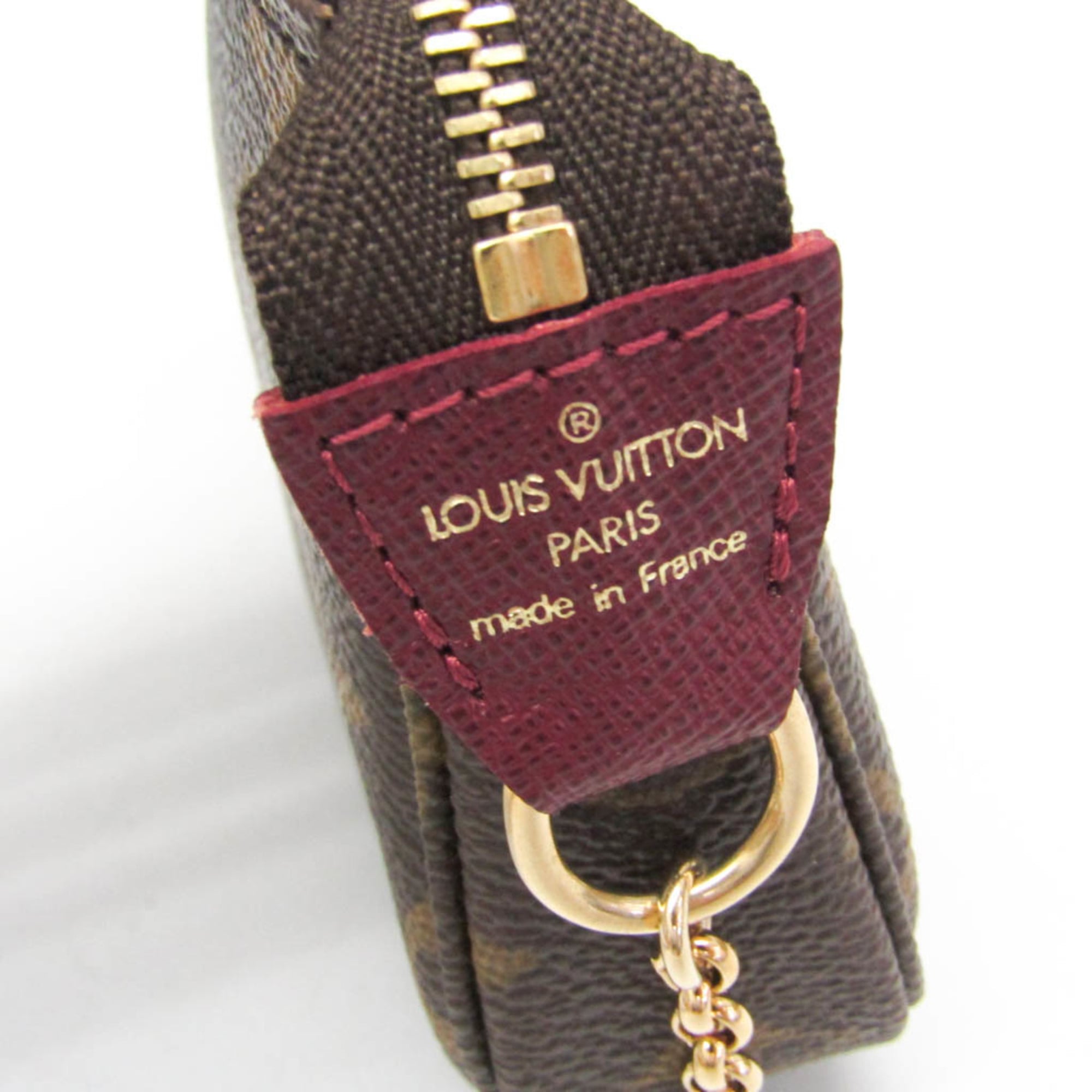 Louis Vuitton Monogram Mini Pochette Accessoires Label Collection M63798 Women,Men Handbag,Pouch Monogram,Wine — Like New